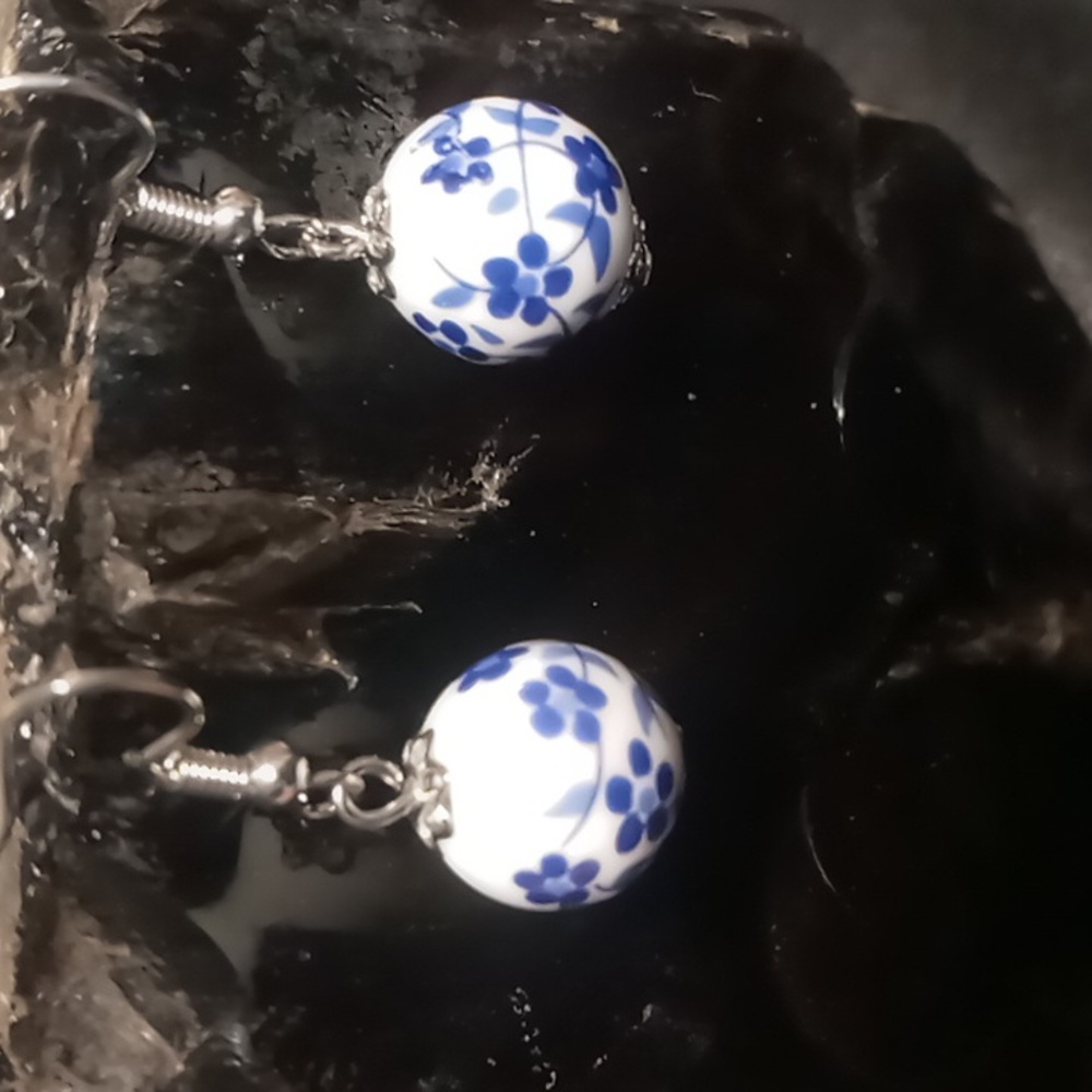 Baked beads porcelain with blue floral print.